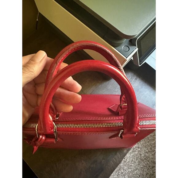 LOUIS VUITTON FUCHSIA RED ALMA WITH SILVER HARDWARE; LOCK & KEYS AND CLOCHETTE - Picture 6 of 14